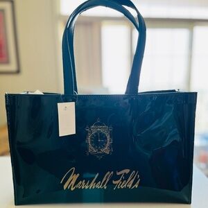 Marshall Fields Large green vinyl bag with Iconic clock Logo. NWT. Gift …
